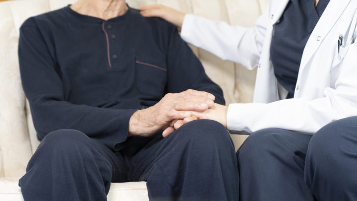 Holding Touching hands Asian senior or elderly old man patient with love, care, helping, encourage and empathy at nursing hospital ward : healthy strong medical concept