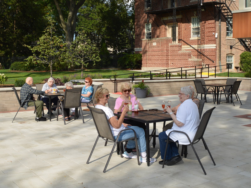 Seniors Enjoying Wine on the Patio in Norwood Park, Chicago