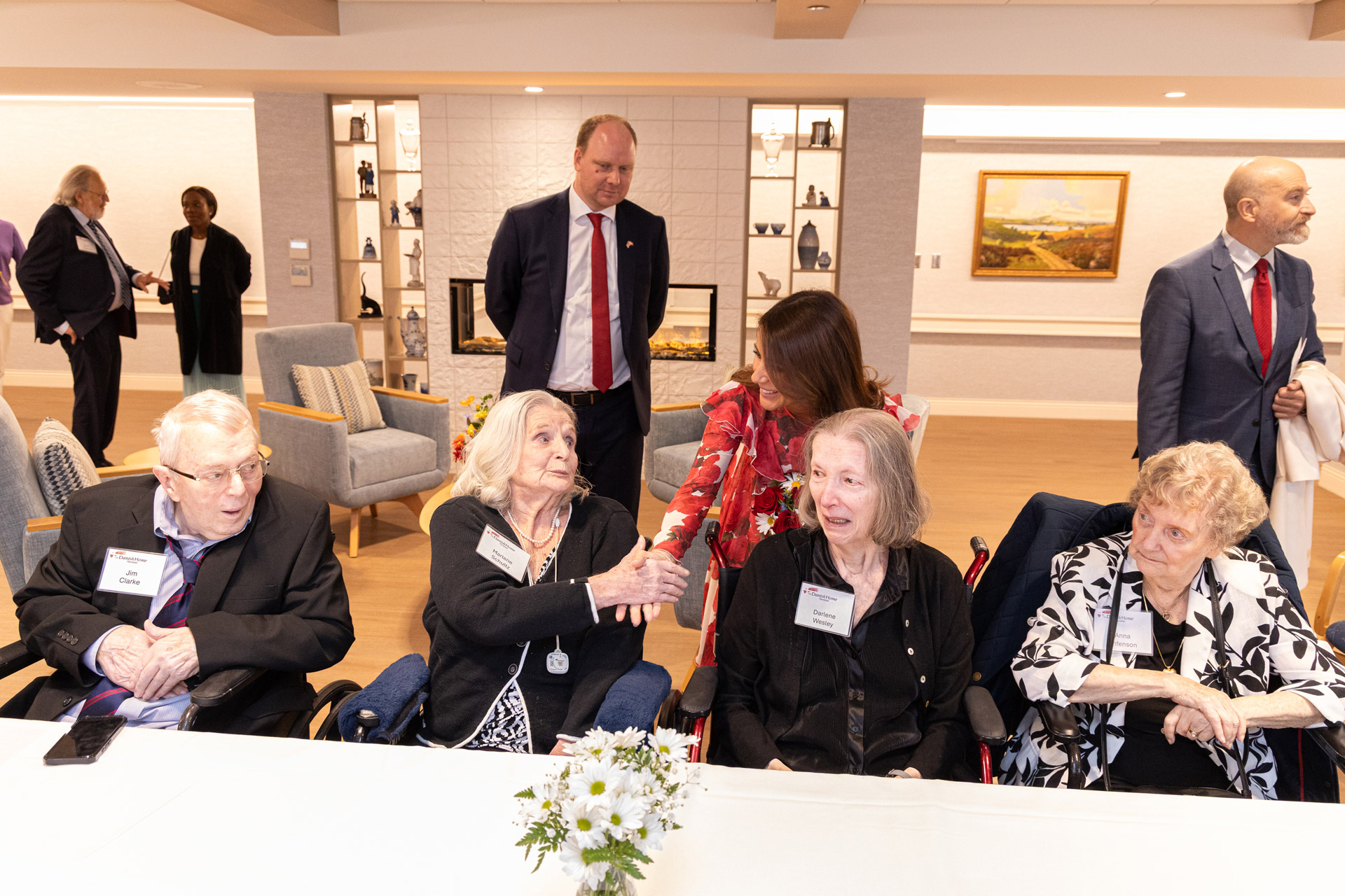 Her Royal Highness shaking residents hands